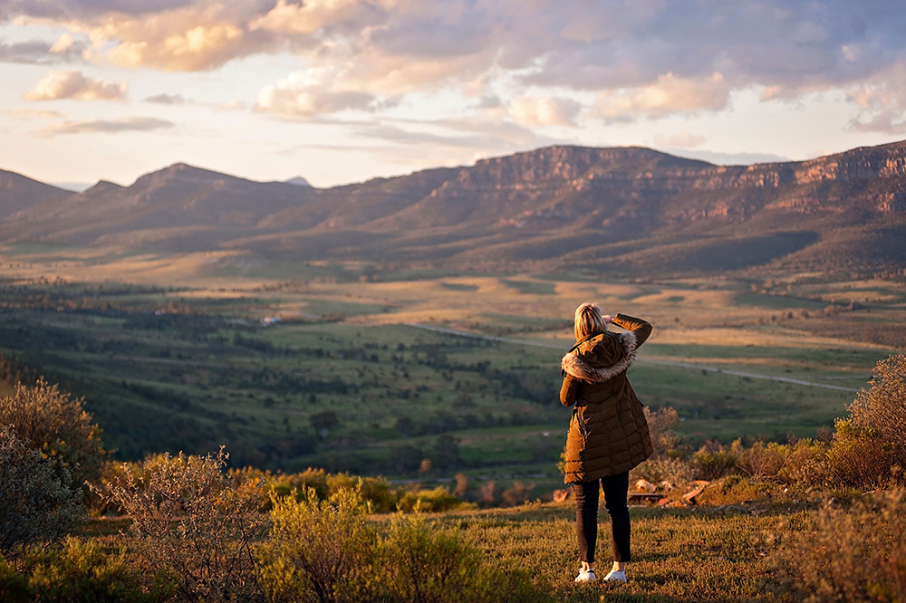 Full Body View Woman Looking Out At Vast Mountains, Dreamaroo Australia 14.
